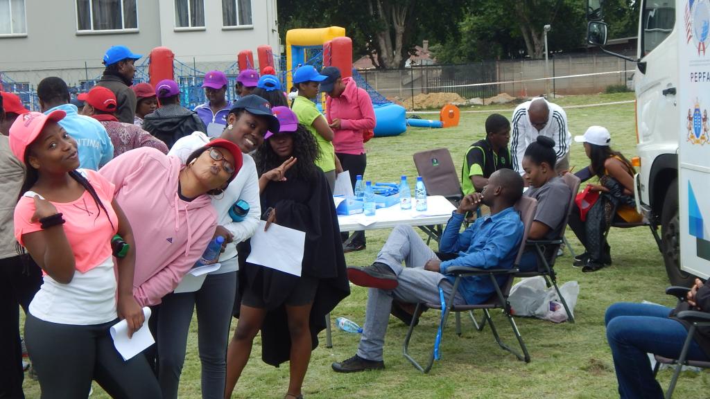 Group standing by table
