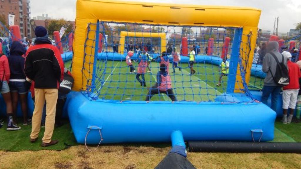 Children playing soccer.