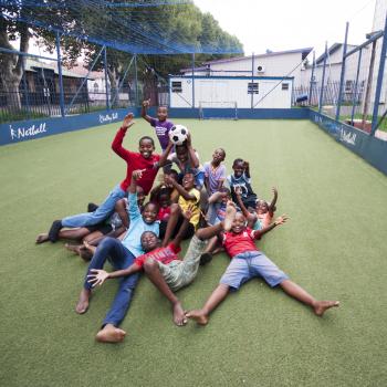 children on soccer pitch