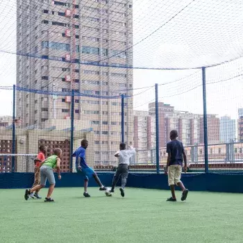 Children playing soccer